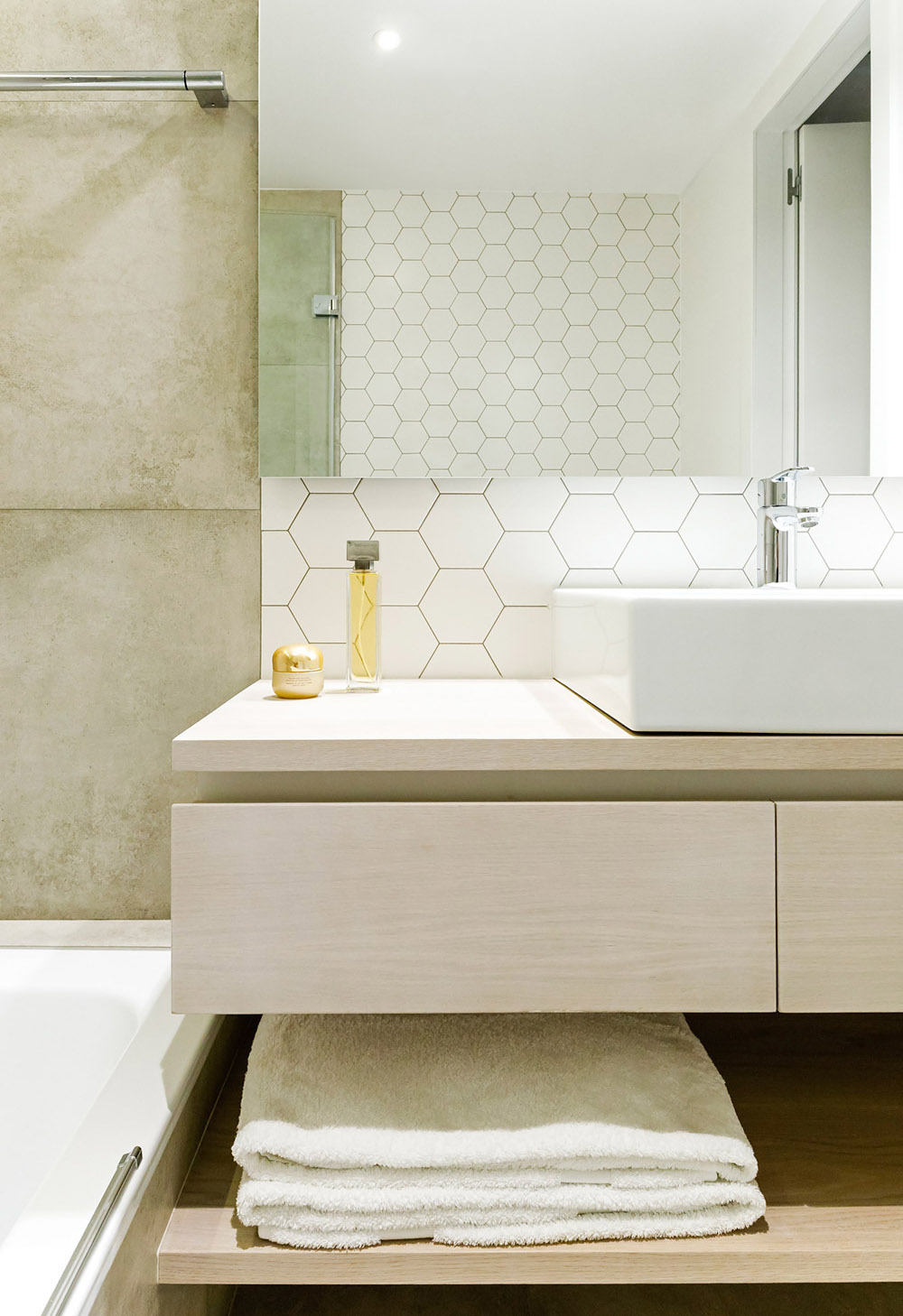 La Escala bathroom with oak counters and built in bath