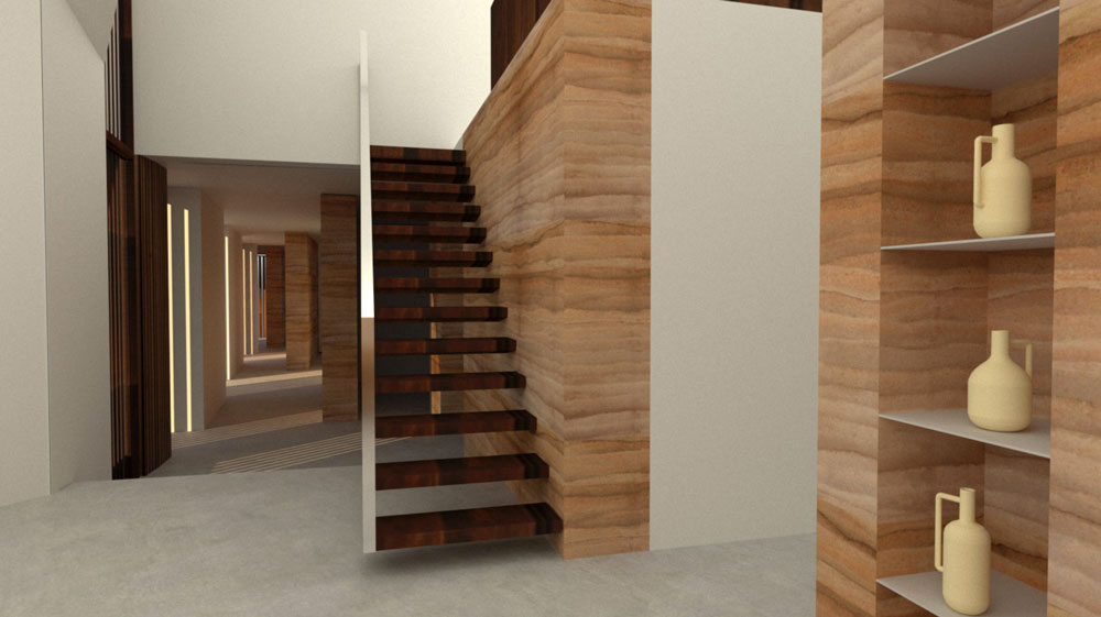 wooden stair cantilevered off rammed earth wall in the new build in Matarraña