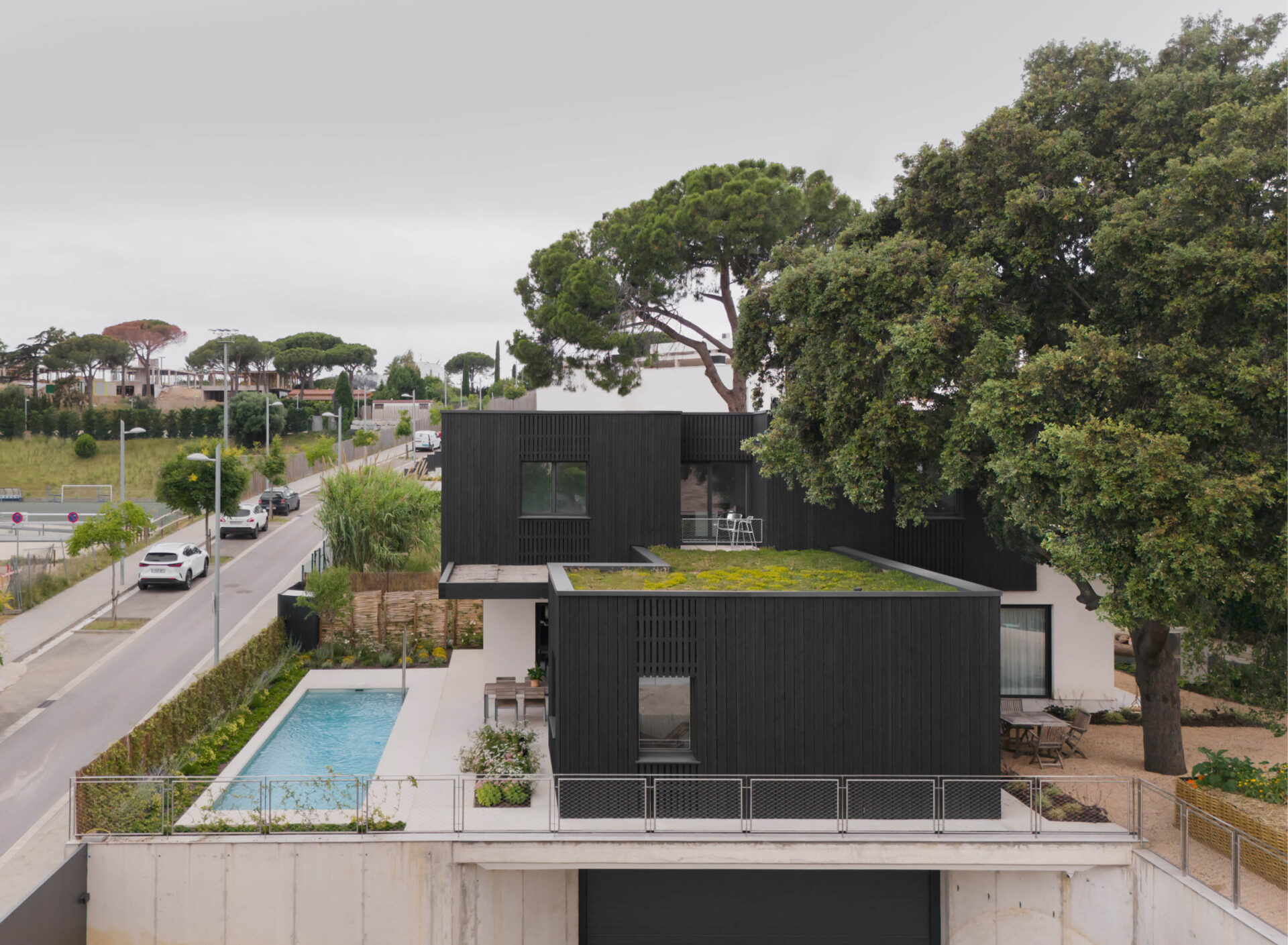 Contemporary timber frame architecture by Barcelona architects featuring CLT and charred timber